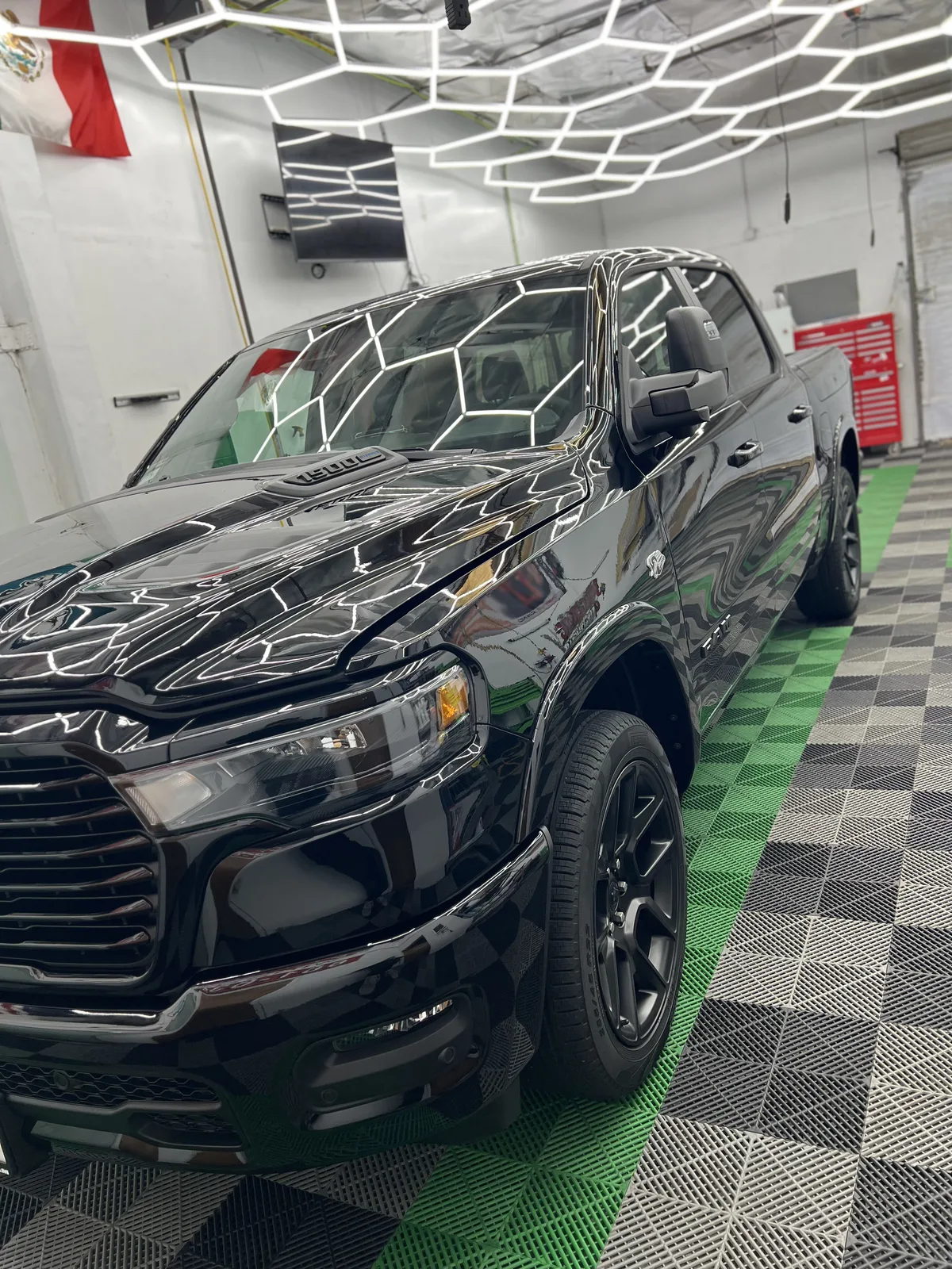 Black RAM truck after the Stage 1 paint correction and 5-year ceramic coating special